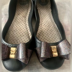 Zaxy by melissa black flats with glitter bow.